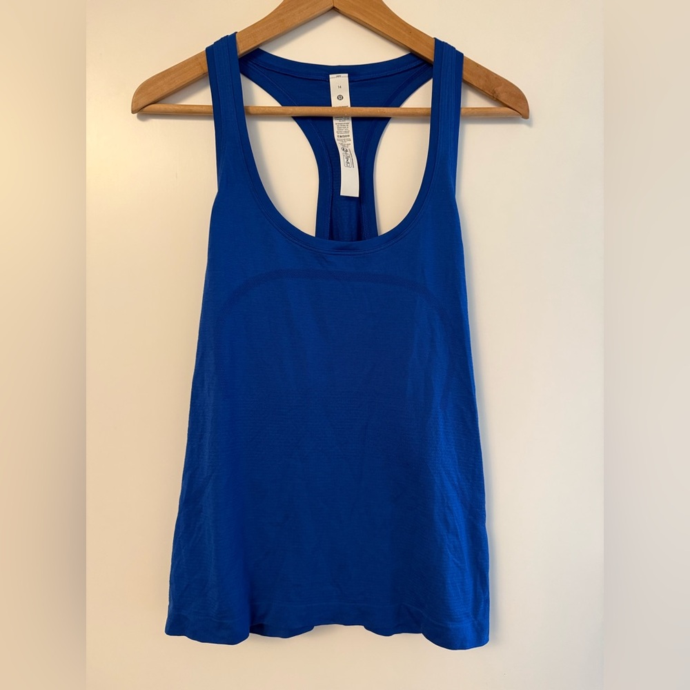 Swiftly Tech Racerback
Tank Top 2.0 *Waist Length NWT size 14
